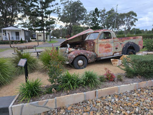 Rusty old ute - featured in Garden at Crows Nest Tourist Park