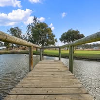 board walk over lake at Crows Nest Tourist Park