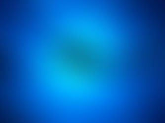 divers in the blue diving down in the open ocean