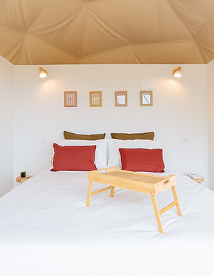 letto matrimoniale interno alla cupola con vista panoramica