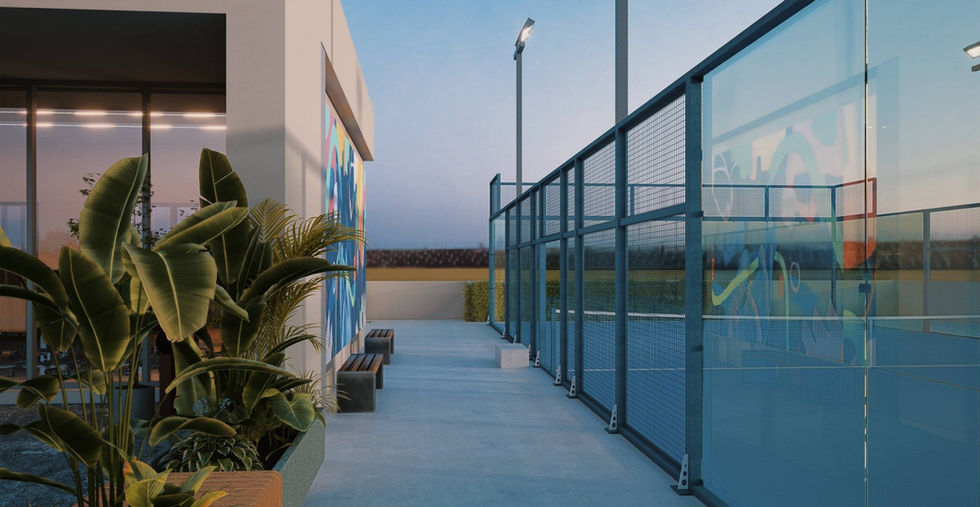 Área deportiva del SCALA Lifestyle and Business Center con cancha iluminada y murales modernos.