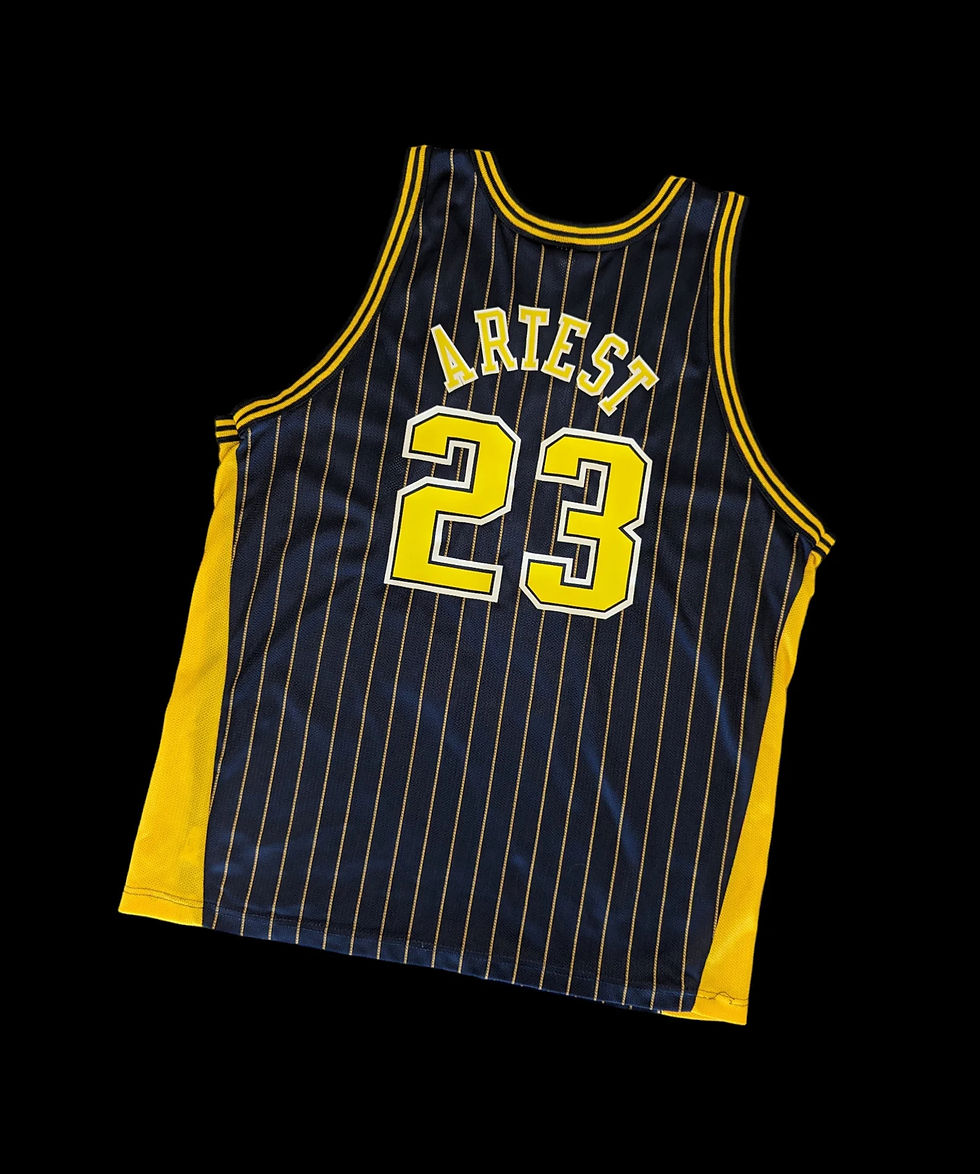 Here's the back view of the blue Indiana Pacers Ron Artest Champion Jersey Size 44