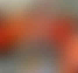 Men in orange life vests having Iftar on a boat