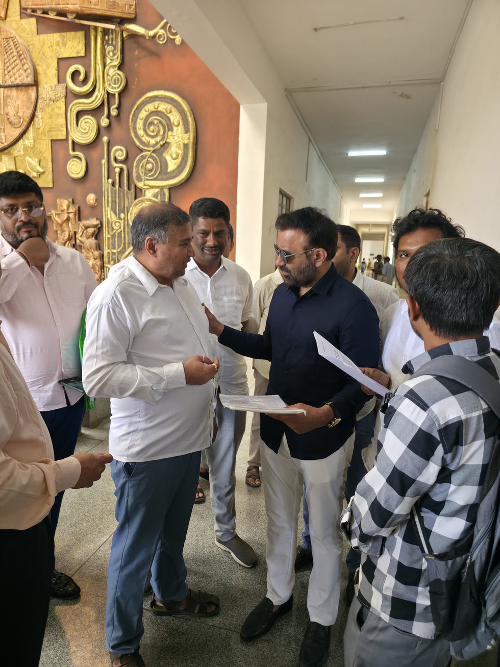 Men discussing at Tantric Cricket League 2026 event