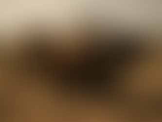 1 Samuel 6 — Cows, Gold Tumors, and a Road Home. Two oxen pull a wooden cart with golden objects in a desert landscape, casting a serene, dusty atmosphere under a soft, warm light.