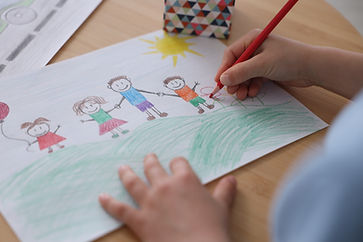 child-s-hands-drawing-a-colorful-picture-of-a-fami-2026-07-24-22-27-12-utc.jpg