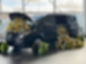 Luxurious Easter themed sunflower arrangement for high end Mercedes showroom