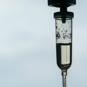 Close-up of an IV vitamin drip delivering nutrients for an energy boost