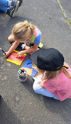 kids painting at community event