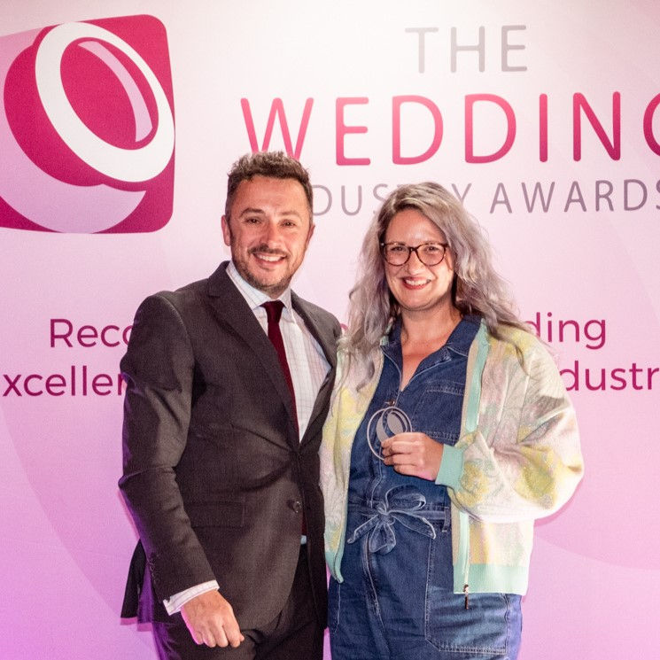 the wedding industry awards presents the winner of the special touch category with an award