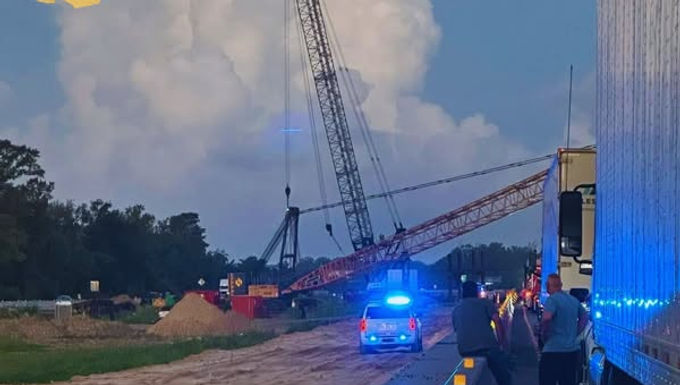 30-Second Takeaway An unauthorized individual entered a construction crane near Vinton, Louisiana, before dawn on August 16, obstructing westbound lanes of I-10 and causing multiple vehicle crashes and injuries. Louisiana State Police reported that the crane was not in operation at the time and that the individual allegedly manipulated the boom, sending cables into active traffic. The incident highlights the risks posed by unsecured heavy equipment and the importance of site security and rapid emergency response. Incident Overview Just before sunrise on August 16th , Louisiana State Police  responded to a serious incident on Interstate 10 near Vinton . A construction crane, not scheduled for operation, was found obstructing westbound traffic lanes. The obstruction resulted in multiple vehicle crashes , injuries, and extended traffic delays on one of the region’s primary transport routes. Sequence of Events According to investigators, 37-year-old Matthew Vincent  allegedly abandoned his truck after it became stuck in a nearby field. He then crossed the interstate and gained unauthorized access to the crane . Once inside the cab, Vincent allegedly manipulated the boom, causing cables to extend into active traffic lanes . The action led to two reported injuries , several vehicle collisions, and property damage before law enforcement secured the scene and took the individual into custody. Why This Incident Was Possible While the crane was not in operation, the incident highlights a known risk in the industry: idle heavy equipment remains fully capable of movement if controls are accessible . Cranes positioned near public roadways, especially during off-hours, can become vulnerable if: Operator cabs are left unlocked Control systems remain energized Physical barriers or exclusion zones are minimal Sites are unattended for extended periods Emergency Response Louisiana State Police  responded quickly, securing the crane, managing traffic flow, and preventing further escalation. Their prompt action limited the incident to the reported injuries and avoided additional collisions. Editorial Note Crane Hub Global covers incidents involving cranes and lifting equipment to support industry learning, safety awareness, and risk prevention. This article focuses on established prevention measures used across the crane industry. How This Incident Could Have Been Prevented Securing the Crane Cab Locking operator cabs and control compartments is a basic but critical measure. Restricted access prevents unauthorized individuals from entering and manipulating crane controls. Control System Lockout De-energizing crane control systems when not in use through ignition lockout, key removal, or electronic shutdown reduces the risk of unintended movement. Physical Barriers and Exclusion Zones Temporary fencing, barricades, or physical obstructions around cranes positioned near live traffic can deter access and provide an additional layer of protection. Off-Hours Site Monitoring For sites adjacent to highways or public areas, motion sensors, cameras, or periodic security patrols can help identify unauthorized access before an incident escalates. Placement and Parking Practices Whenever possible, cranes should be parked with booms lowered, slewing restricted, and components positioned away from active roadways to minimize exposure if accessed.