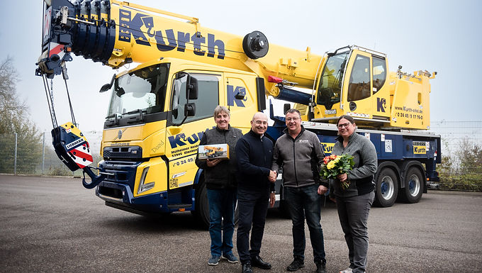 Kurth Autokrane has taken delivery of a Liebherr LTF 1060-4.1. The 60-tonne truck-mounted telescopic crane replaces a 15-year-old LTF 1045-4.1 in the fleet of the company from Blankenheim in North Rhine-Westphalia. The higher load capacity and good experience with the predecessor tipped the scales in favor of the 60-tonner on series trucks. Kurth Autokrane has many years of experience with truck-mounted telescopic cranes. For 15 years, the company operated an LTF 1045-3.1, and before that an LTF 1040. Managing Director Marcel Kurth explains: “We have had good experiences with the Liebherr truck-mounted cranes, but the LTF 1045-4.1 was now increasingly reaching its performance limit. That is why we decided to buy the much more powerful LTF 1060-4.1. Fuel consumption and maintenance costs are lower for cranes with a truck chassis.” The cost-effectiveness of LTF cranes in everyday use is guaranteed by low operating costs, as the design of a standard truck means that it consumes less fuel than a comparable all-terrain crane. The power of the superstructure engine is precisely matched to the requirements of crane operation. Using a standard truck as the crane chassis also means lower costs for tires and other wearing parts as they are mass-produced. Truck driver's cabs are also available with sleeping facilities, if necessary, which is beneficial for certain crane jobs. The compact dimensions and low axle loads of the LTF mobile cranes ensure maximum flexibility. LTF cranes comply with all the criteria for an unlimited permanent road license in Germany. The LTF 1060- 4.1 is an economical alternative for crane operators in the taxi crane class, as the 4-axle vehicle travels with a total ballast of 10.2 tonnes with a maximum axle load of 9 tonnes on the front axles and 12 tonnes on the rear axles. The crane’s gross weight remains under 42 tonnes and it is immediately ready to start work on site with its maximum lifting capacity. No additional transport vehicles are required for ballast weights or equipment. By reducing the ballast carried on the crane, the total weight can be reduced to less than 33 tonnes, which has a positive effect on driving licenses and registration options. The LTF 1060-4.1 telescopic truck-mounted crane is a low cost alternative in the taxi crane class. Why? First of all, the 4-axle crane can carry all its ballast on public roads. This means that it is immediately ready for action once it reaches the site and it does not require any transport vehicles. Secondly, the truck-mounted crane is mounted on a standard truck chassis. That means you benefit from lower costs for tires and common truck parts compared to all-terrain cranes. Finally, the various axle loads can be adjusted quickly, meaning that long-term permits for many roads can be obtained significantly more easily. This year, Kurth Autokrane is celebrating its 25th anniversary. Marcel Kurth founded his company in 1999: “We started very small with one crane, one driver, and my strong wife at my side.” Today, Kurth operates 126 machines with 19 employees and is an all-around service provider for cranes, work platforms, ground-level work, and heavy haulage as well as towing and recovery services for trucks. “In 25 years, we have grown in a customer-orientated way with a sense of proportion and purpose. We have a good relationship with Liebherr. The products retain their value, are easy to maintain, and are innovative. The service at Liebherr is excellent. The team at the Oberhausen branch is fully committed to its customers, even under challenging conditions,” says Marcel Kurth.
