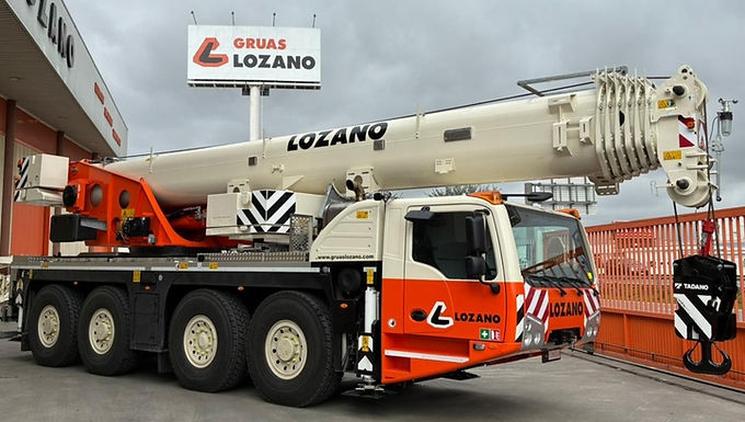 30-Second Takeaway Spanish crane and access rental company Grúas Lozano has expanded its fleet with a new Tadano AC 4.080-1 all-terrain crane, offering an 80-tonne lifting capacity and a 60-metre boom. Designed for versatility and efficiency, the crane can carry up to 9.3 tonnes of counterweight within 12-tonne axle limits, making it ideal for taxi crane operations. The addition strengthens Lozano’s ability to deliver flexible lifting solutions across its multi-location network in Spain. Grúas Lozano Expands Fleet with Tadano AC 4.080-1 Grúas Lozano, a leading Spanish crane and access rental provider, has taken delivery of a Tadano AC 4.080-1 all-terrain crane, further strengthening its lifting capabilities. The new crane will support a wide range of lifting applications across the company’s operations in southern and central Spain. Compact Power with Strong Performance The Tadano AC 4.080-1 all-terrain crane is a four-axle machine designed to combine mobility, lifting performance, and efficiency. Key specifications include: 80-tonne lifting capacity 60-metre seven-section telescopic boom 8.5 to 16-metre bi-fold swingaway extension Maximum tip height of nearly 79 metres Up to 40 degrees offset These features enable the crane to handle a wide range of lifting tasks, from construction to industrial applications. Efficient Transport and Taxi Crane Capability One of the key advantages of the Tadano AC 4.080-1 is its ability to operate efficiently as a taxi crane. Carries up to 9.3 tonnes of counterweight on board Maintains compliance with 12-tonne axle load limits Reduces the need for additional transport vehicles This makes it particularly well-suited for urban job sites and fast-paced lifting operations. Supporting a Diverse Fleet and Service Offering Founded in 1959, Grúas Lozano has grown into a major regional player with multiple service locations, including: Seville (headquarters) Granada, Cadiz, Malaga, Huelva, and Badajoz The company also operates three dedicated platform depots in: Almería Cordova Jaén Its crane fleet ranges from 35 to 700 tonnes, alongside lattice crawler cranes up to 450 tonnes. Integrated Access and Training Capabilities Through its access division, Lorenzo Platforms, the company operates a fleet of approximately 600 units, including: Boom lifts and scissor lifts Spider lifts and mast booms Trailer lifts and truck-mounted platforms The division also runs an IPAF training centre, supporting operator training and safety standards across the industry. Strengthening Regional Lifting Capabilities The addition of the Tadano AC 4.080-1 all-terrain crane enhances Grúas Lozano’s ability to deliver flexible, efficient, and high-performance lifting solutions across its service regions. With its combination of compact design, strong lifting capacity, and transport efficiency, the crane is well-positioned to support a wide range of projects. About Grúas Lozano Grúas Lozano is a Spanish crane and access rental company founded in 1959, with operations across multiple locations in Spain. The company provides crane hire, access equipment, and operator training services across construction and industrial sectors. About Tadano Tadano is a global manufacturer of lifting equipment, including all-terrain cranes, known for its focus on safety, reliability, and innovation in crane technology. Website: https://www.tadano.com Frequently Asked Questions What crane did Grúas Lozano purchase? Grúas Lozano purchased a Tadano AC 4.080-1 all-terrain crane. What are the key features of the AC 4.080-1? The crane includes a 60 m boom, up to 79 m tip height, and 80-tonne lifting capacity, along with strong taxi crane capabilities. What makes this crane suitable for urban work? Its ability to carry 9.3 tonnes of counterweight within 12-tonne axle limits reduces transport requirements and improves efficiency. Where does Grúas Lozano operate? The company operates across multiple locations in Spain, including Seville, Granada, Malaga, and Cadiz. What other services does the company provide? In addition to crane rental, Grúas Lozano offers access equipment rental and IPAF-certified training services.