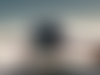 A professional DJI drone on the ground at sunset, used for real estate aerial photography and inspections.