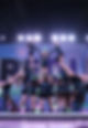 girls doing a cheerleading pyramid at competition