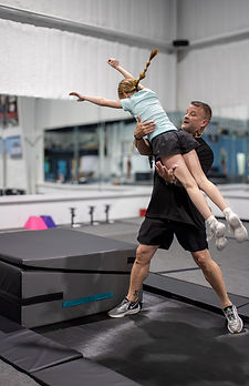 girl in tumbling class learning full.jpg