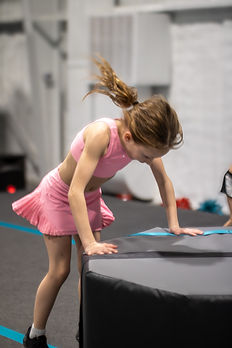girl in tumbling tuck class.jpg