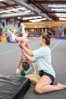 tumble basics athlete doing kickover.jpg