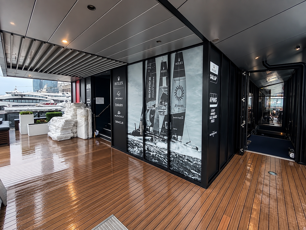 SailGP partner branding across custom vinyl panels aboard Starship Sydney in Sydney