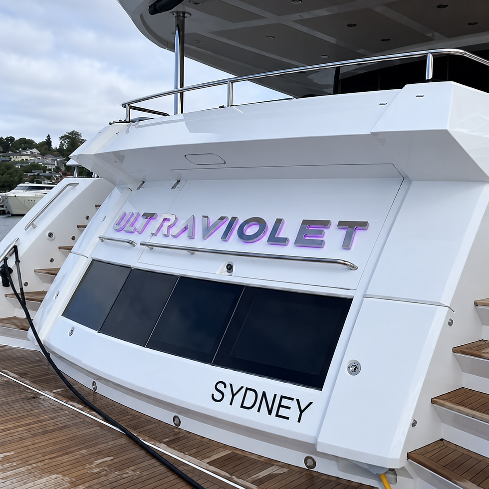 ULTRAVIOLET stainless steel boat name with purple LED backlighting on a 28m Sunseeker yacht