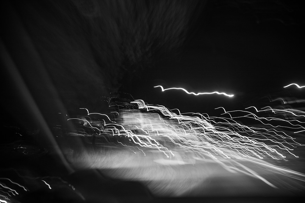 A black and white ICM photograph of light trails by Megan Kennedy