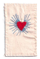 An abstract sampler featuring embroidery of the sacred heart by Canberra artist Megan Kennedy