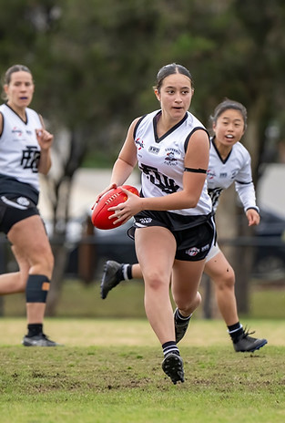 Tayla running out of the pack