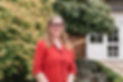 Smiling woman in red shirt, Money Mindset Master