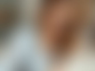 A female business owner working on her computer