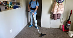 Professional cleaner mopping floor in Tacoma home