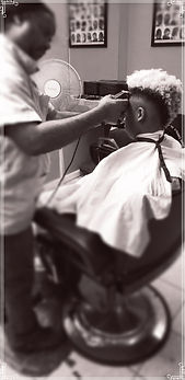 Trini DMT Barber doing a custom mohawk at dmt barbershop in queens ny