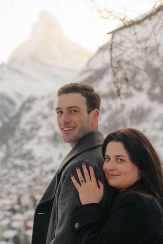 fiancée resting her head on her fiancé's shoulder