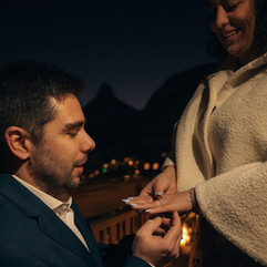 a man proposes to his girlfriend in a fairytale setting