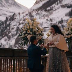 a man gets down on one knee in a surprise ACOTAR proposal