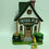 Thumbnail: St. Patrick's Irish Pub House Figurine + Mini Autographed Tinker Bell Figurine