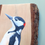 Thumbnail: close up of woodpecker painting on reclaimed wood