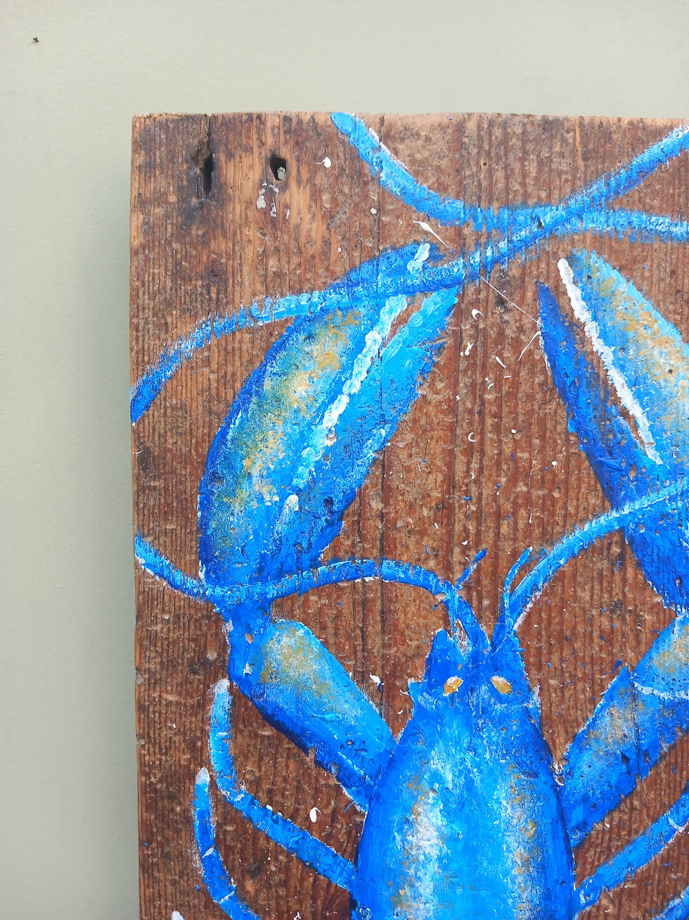 Thumbnail: blue lobster on reclaimed wood