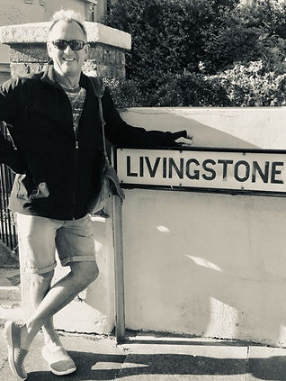 Gary next to the Livingstone Road street sign