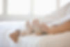 Couple's Feet in Bed