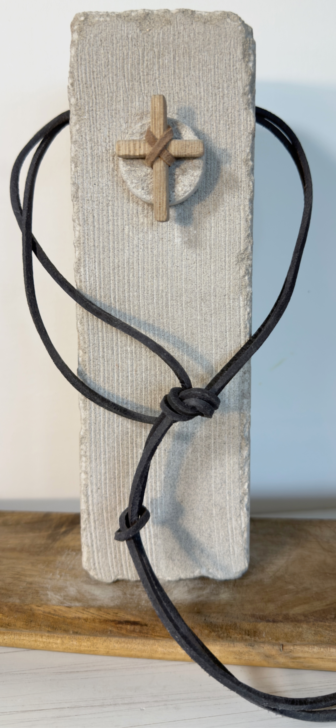 Small square limestone sculpture hand carved in Iowa.