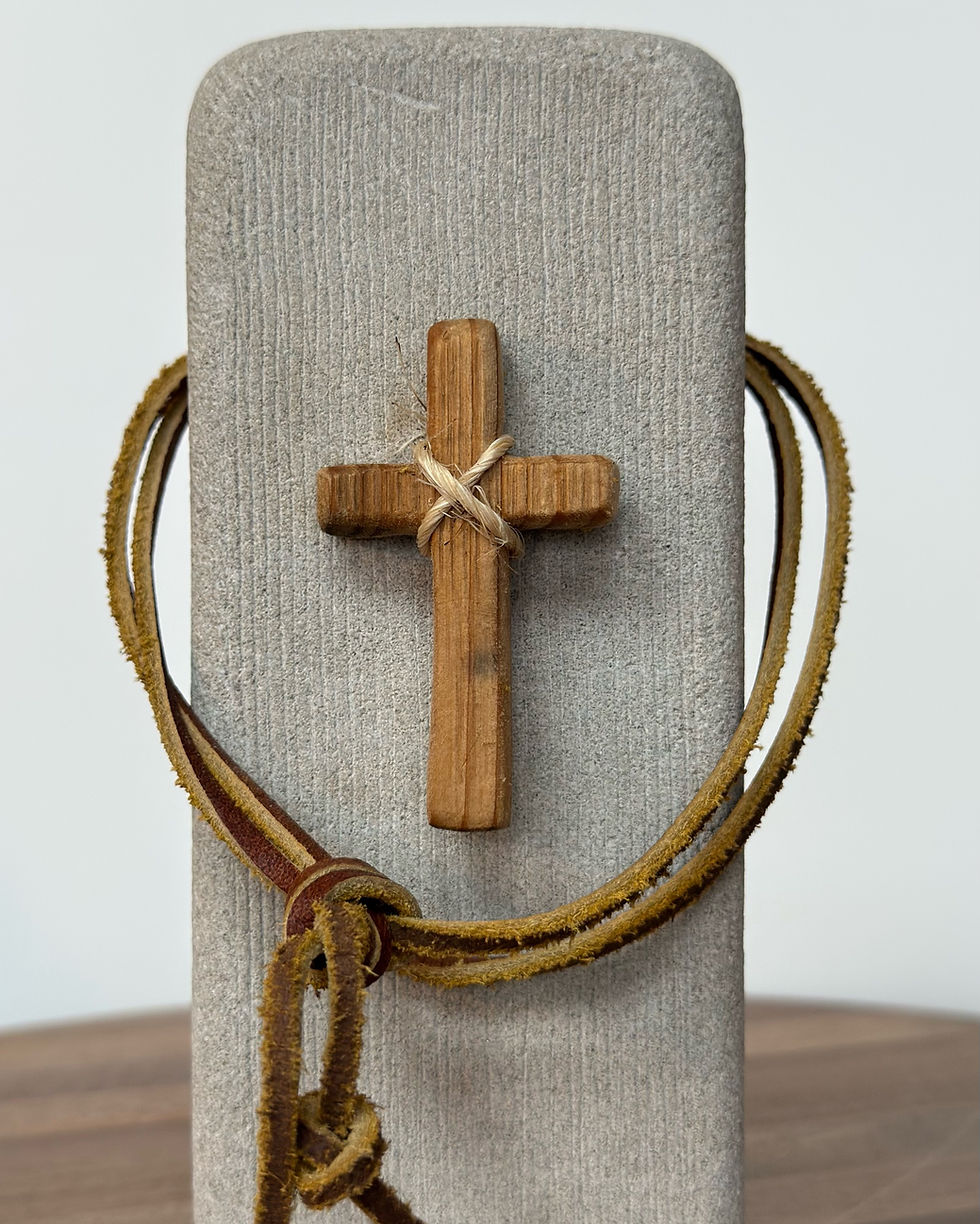 Natural cord wrapped stone with Christian cross