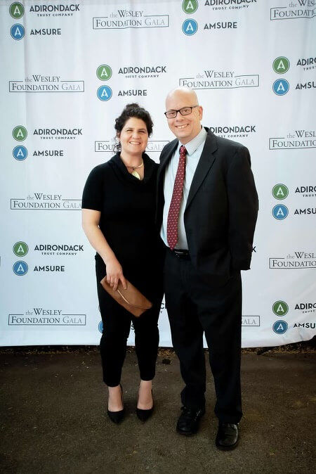Posing together at an event. 