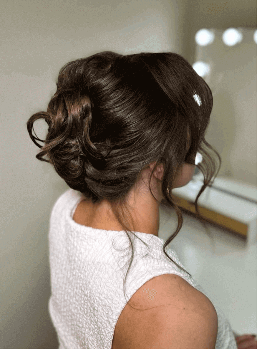 High bun with braided accents.