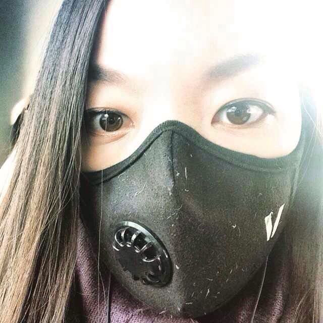 Woman in pollution mask