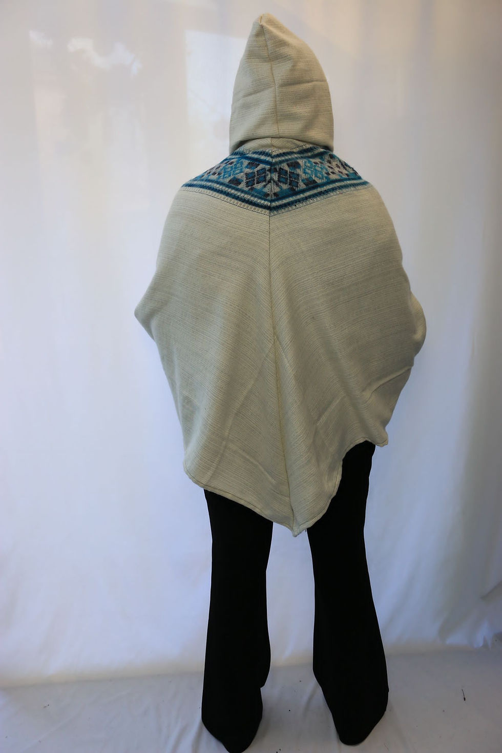 Thumbnail: White Ponchos with Blue Patterns
