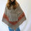 Thumbnail: Light Brown Ponchos with Intricate Orange Patterns