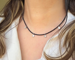 Black spinel gemstone and silver necklace