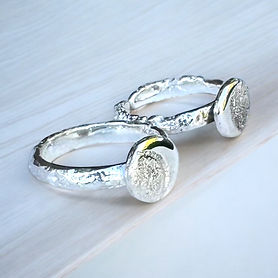two silver moon rings
