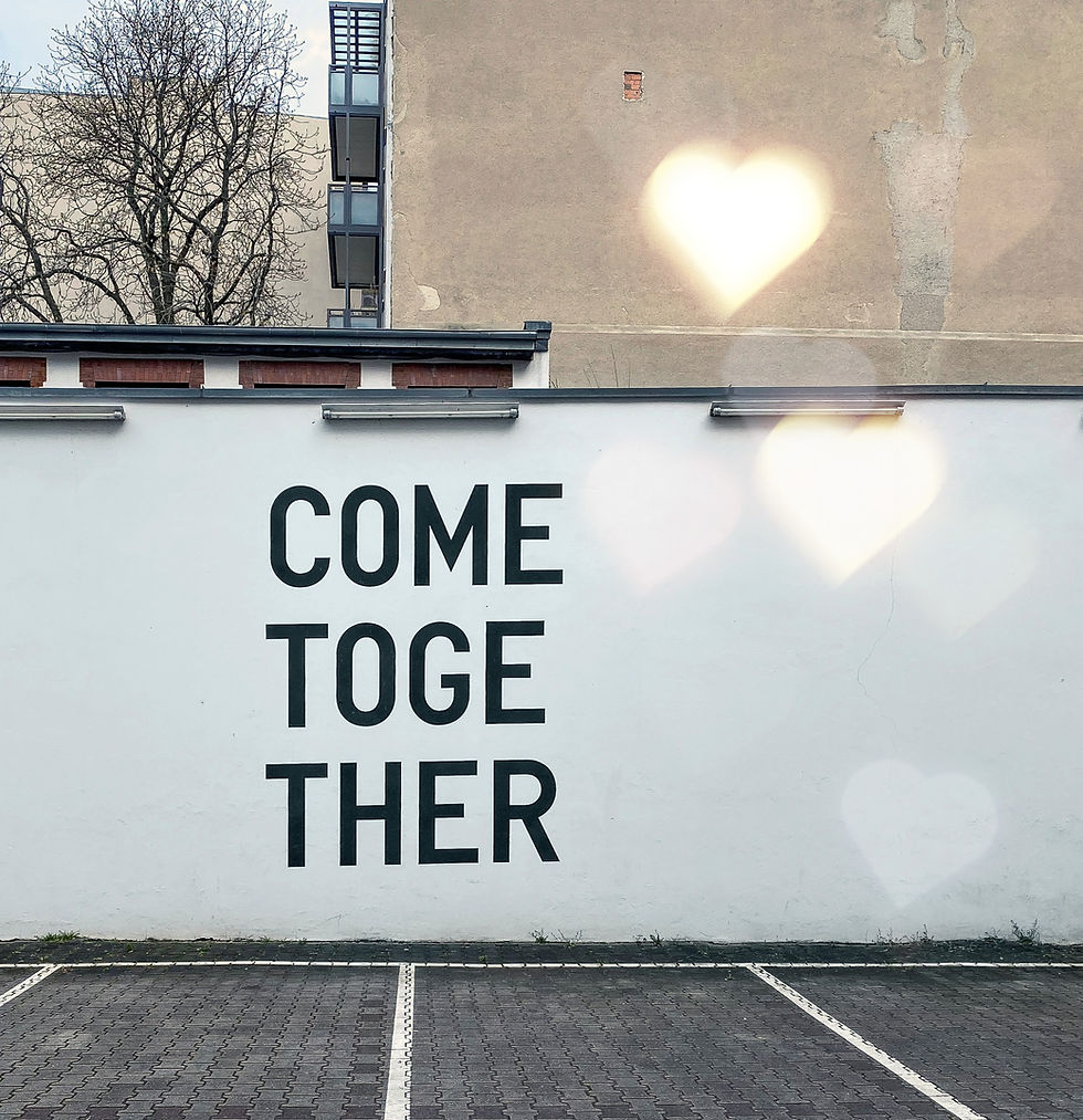 An image featuring a white wall with the words 'Come Together.' Explore the power of connections in life #cometogether