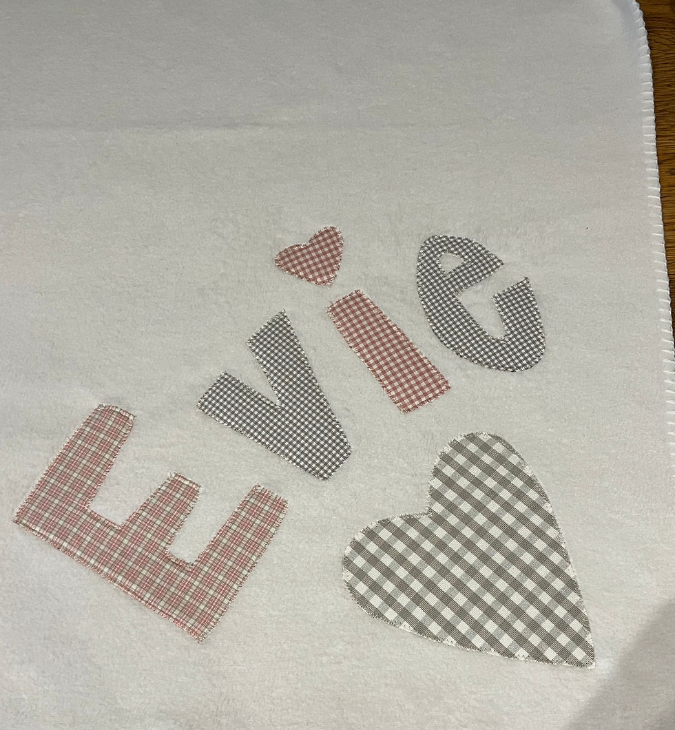 Thumbnail: Cream Personalised Baby Blanket with muted pink pastel letters